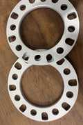 8-lug universal aluminum wheel spacers front view

High-quality lightweight 12mm truck wheel spacer set

Precision drilled bolt holes in 8-lug wheel spacer

Spacer inner diameter and bolt pattern detail

Side-by-side wheel spacer comparison for trucks
