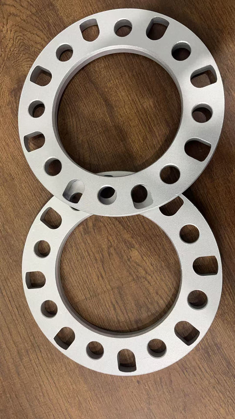 8-lug universal aluminum wheel spacers front view

High-quality lightweight 12mm truck wheel spacer set

Precision drilled bolt holes in 8-lug wheel spacer

Spacer inner diameter and bolt pattern detail

Side-by-side wheel spacer comparison for trucks