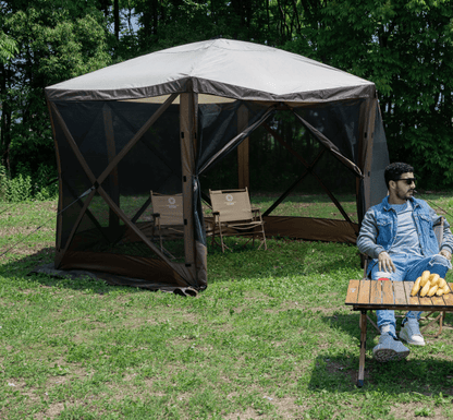 8-person pop-up camping screen tent with mesh and UV protection

hexagon-shaped 12x12 ft canopy gazebo for outdoor camping

brown outdoor screen house with zippered doors and airflow windows

Easy setup pop-up tent for the backyard and picnic

camping gazebo with mesh sides for insect protection