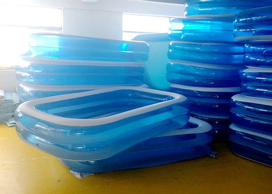 80 inch inflatable swimming pool – full top view

Inflated blue family pool on backyard grass

Folded pool with included storage bag

Kids splashing in inflatable rectangular pool

Side view of inflated rectangular pool