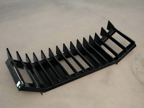 87 Inch Skid Steer Push Rake with Side Wings
Heavy-Duty Skid Steer Rake Blade for Land Clearing
Spaced Tine Rake Blade Attachment
Skid Steer Rake Blade Side View
Front View of Brush Rake Blade Attachment