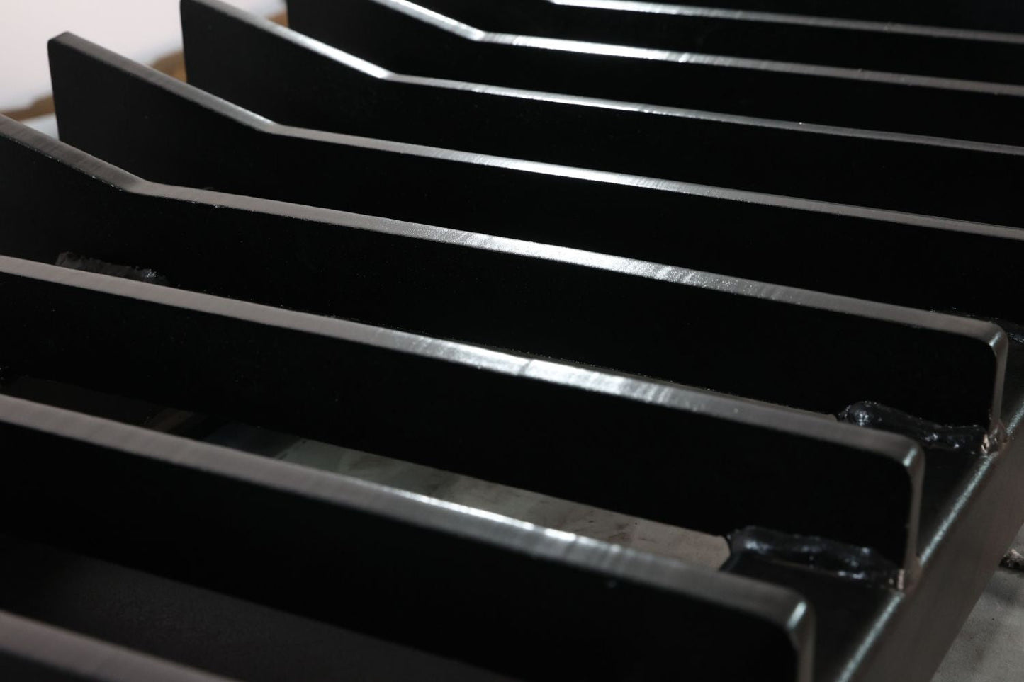 87 Inch Skid Steer Push Rake with Side Wings
Heavy-Duty Skid Steer Rake Blade for Land Clearing
Spaced Tine Rake Blade Attachment
Skid Steer Rake Blade Side View
Front View of Brush Rake Blade Attachment