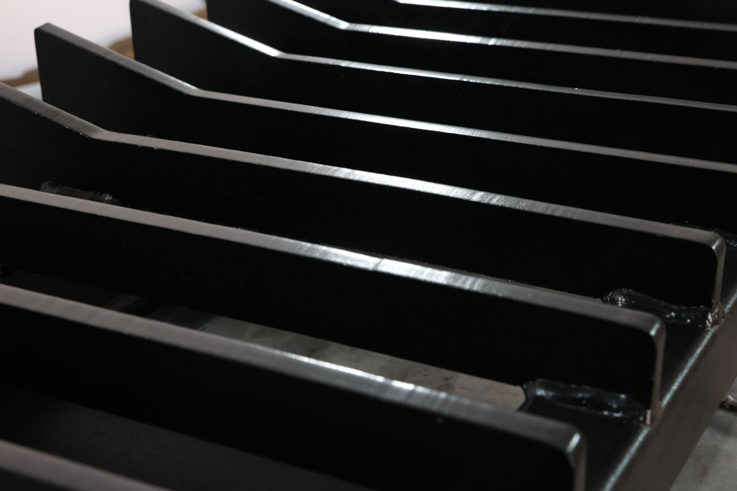 87 Inch Skid Steer Push Rake with Side Wings
Heavy-Duty Skid Steer Rake Blade for Land Clearing
Spaced Tine Rake Blade Attachment
Skid Steer Rake Blade Side View
Front View of Brush Rake Blade Attachment