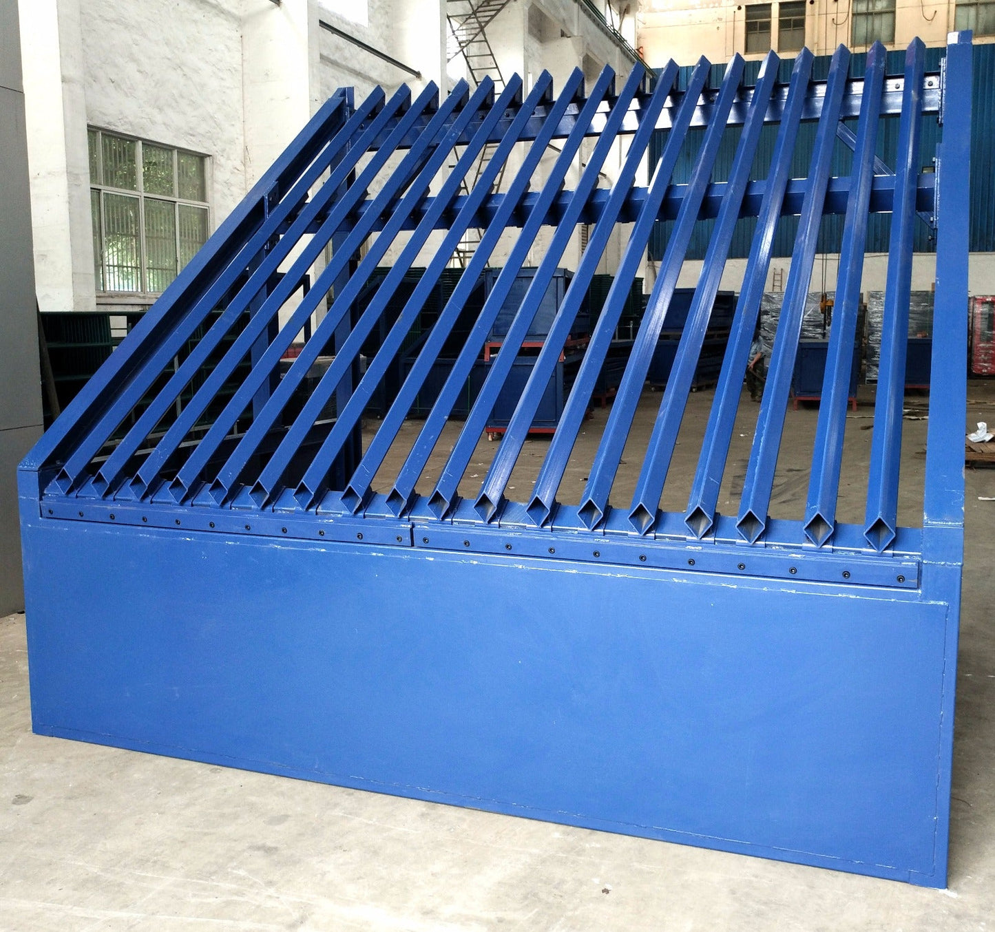 Full view of 9x12 FT Grizzly Rock Screen Separator

Side profile showing adjustable bar spacing

Close-up of steel tubing and support structure

Assembled Grizzly rock separator in construction site

Top view of deck bar spacing system