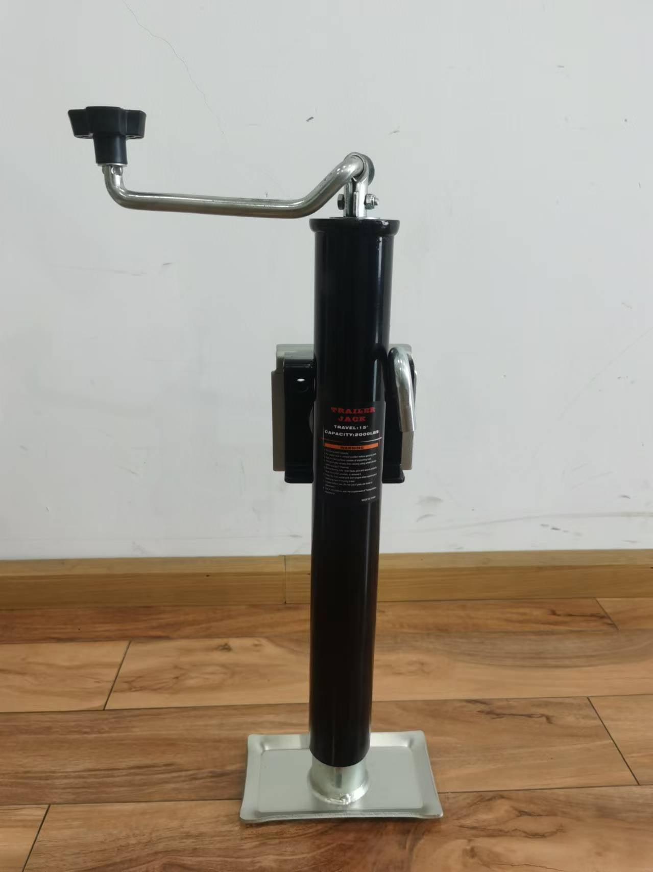“A-frame topwind trailer jack with removable foot plate”

“Utility trailer jack with 15 inch lift and 5000 lb rating”

“Black heavy-duty topwind jack with foot for RV or cargo trailers”