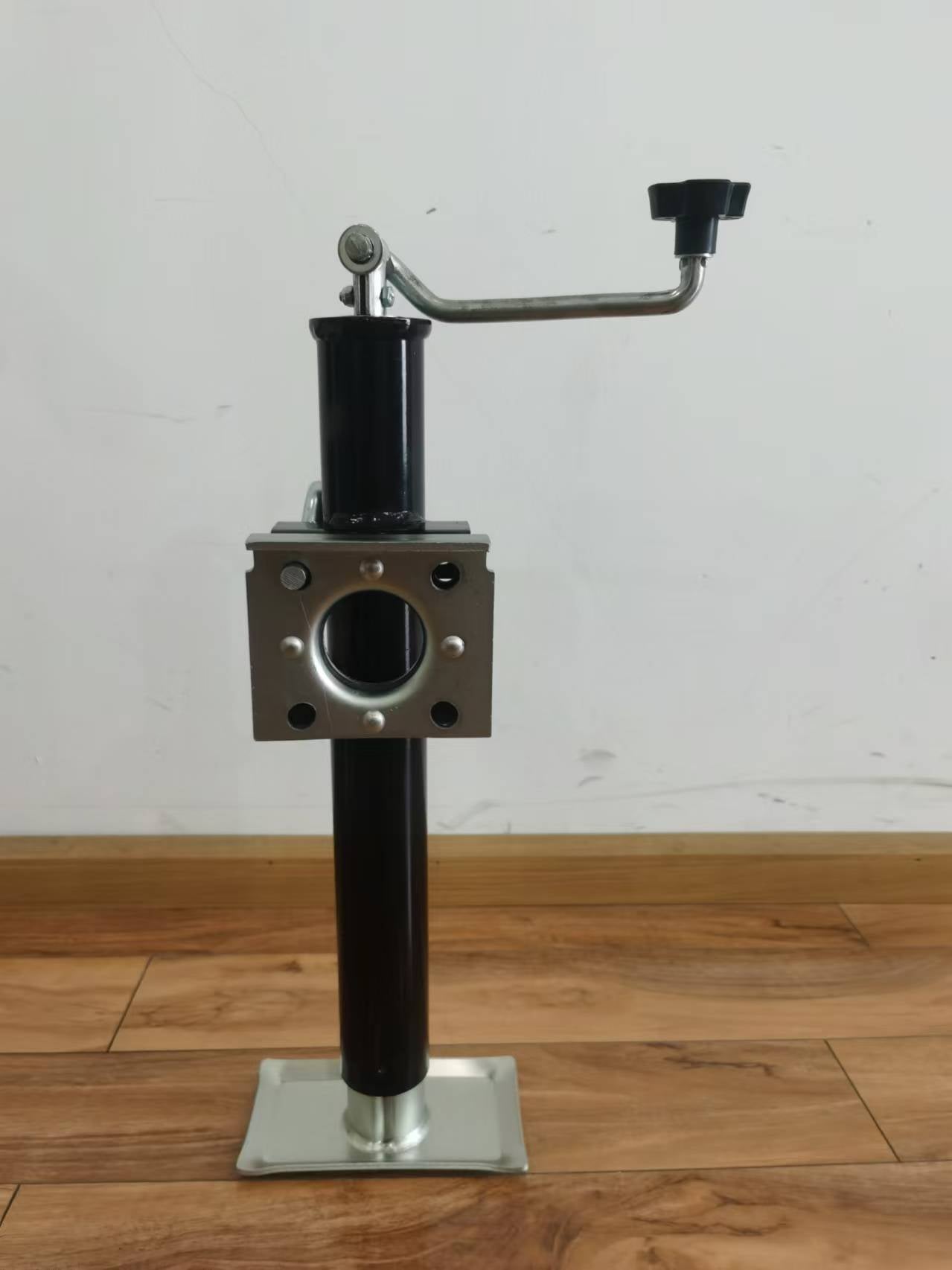 “A-frame topwind trailer jack with removable foot plate”

“Utility trailer jack with 15 inch lift and 5000 lb rating”

“Black heavy-duty topwind jack with foot for RV or cargo trailers”