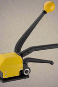 A333 Manual Steel Strapping Tool – Full View with Dual Handle

Heavy-Duty Banding Tool for Pallets and Crates

Yellow and Black A333 Strapping Tool – Top View

A333 Tensioner & Sealer Kit with Accessories