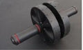 Dual-wheel ab roller with rebound assist – front view

Home workout ab roller with non-slip grips

Ab core trainer – side view with ergonomic handles

Ab wheel fitness roller in black with red detailing
