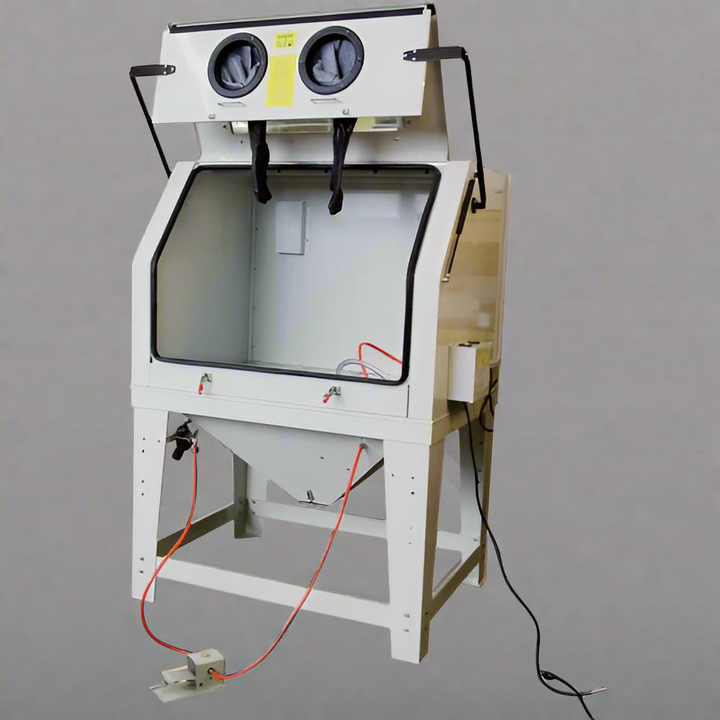 Industrial 990L sandblasting cabinet with blue and white finish, built-in dust collector, and fluorescent lighting
