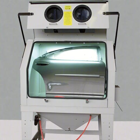 Industrial 990L sandblasting cabinet with blue and white finish, built-in dust collector, and fluorescent lighting
