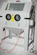 Industrial 990L sandblasting cabinet with blue and white finish, built-in dust collector, and fluorescent lighting
