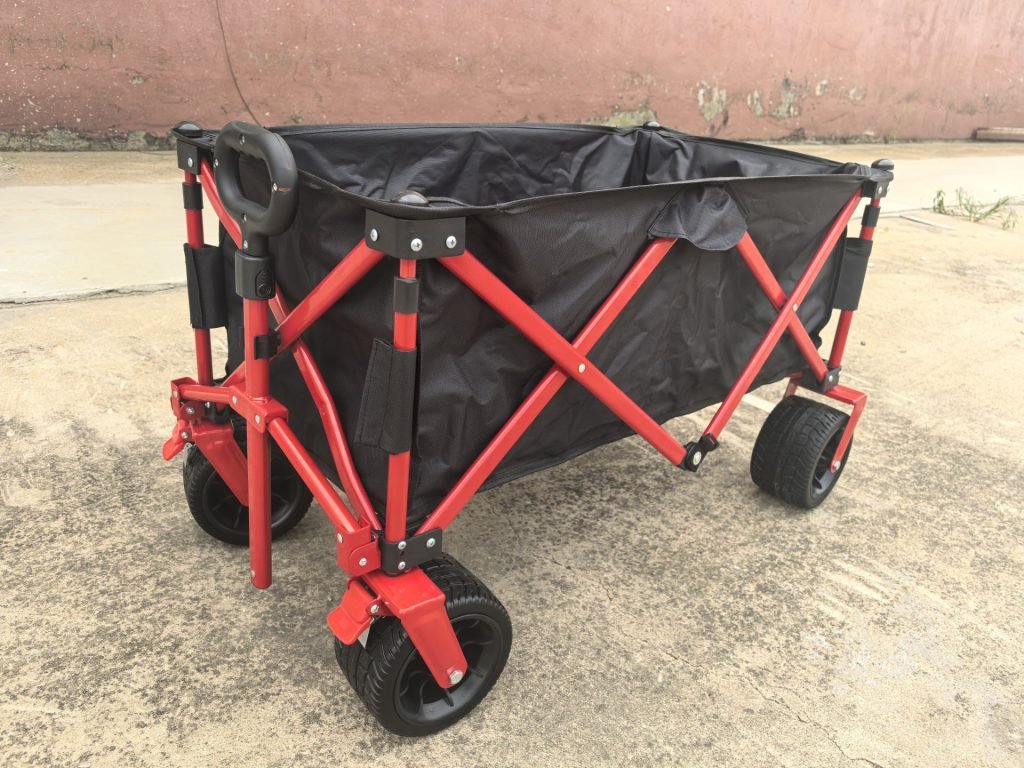 Heavy-Duty Folding Beach Wagon – Front View Loaded
All-Terrain Utility Wagon with Wide Wheels – Red Frame
Collapsible Camping Cart – Folded for Storage
Outdoor Wagon for Sand and Grass – Side View