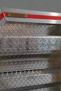 Aluminum truck headache rack installed on flatbed

Rear view of truck cab protector with tool trays

Chain hangers and aluminum rack detail view

Side angle of tool tray and shelf setup

Close-up of mini-vault storage box on aluminum rack