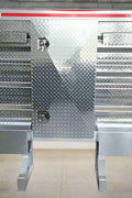 Aluminum truck headache rack installed on flatbed

Rear view of truck cab protector with tool trays

Chain hangers and aluminum rack detail view

Side angle of tool tray and shelf setup

Close-up of mini-vault storage box on aluminum rack