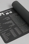 AR-15 rifle cleaning mat with printed parts diagram
Non-slip oil-resistant gun cleaning pad for rifles
AR-15 firearm maintenance mat on workbench