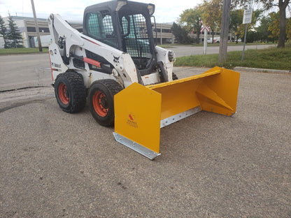 Bendall skid steer snow pusher attached to loader

Yellow snow box blade for skid steer

Heavy-duty snow bucket blade in winter setting

96-inch Bendall box blade in commercial snow use

Rear angle of Bendall snow blade showing mold board

