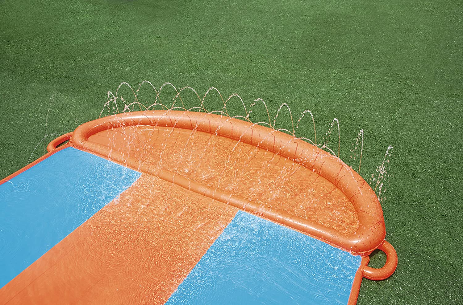 Kids racing on Bestway triple water slide

Three-lane orange slip and slide in backyard

Built-in sprinklers on Bestway water slide

Bestway Aqua Ramp start with splash effect

Inflatable water slide for kids and families