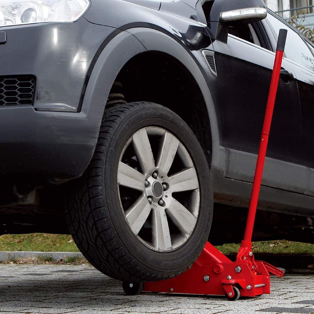 Big Red Steel Floor Jack – 2 Ton Hydraulic Lift Tool
Low Profile Red Garage Jack – Model T83502
Hydraulic Car Jack with Pedal and Casters
Heavy-Duty Vehicle Jack – Wide Base Support
Close-Up of Floor Jack Casters and Lifting Arm