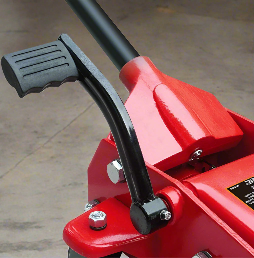 Big Red Steel Floor Jack – 2 Ton Hydraulic Lift Tool
Low Profile Red Garage Jack – Model T83502
Hydraulic Car Jack with Pedal and Casters
Heavy-Duty Vehicle Jack – Wide Base Support
Close-Up of Floor Jack Casters and Lifting Arm