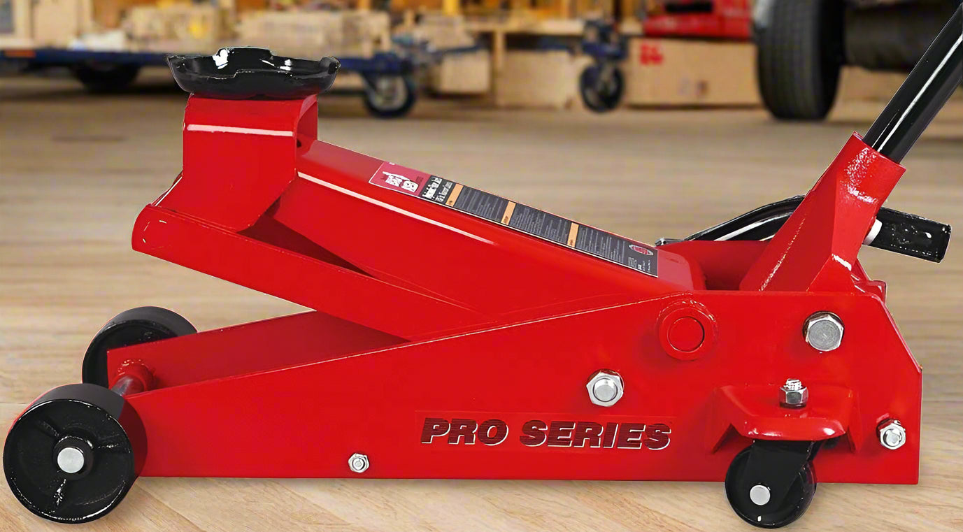 Big Red Steel Floor Jack – 2 Ton Hydraulic Lift Tool
Low Profile Red Garage Jack – Model T83502
Hydraulic Car Jack with Pedal and Casters
Heavy-Duty Vehicle Jack – Wide Base Support
Close-Up of Floor Jack Casters and Lifting Arm