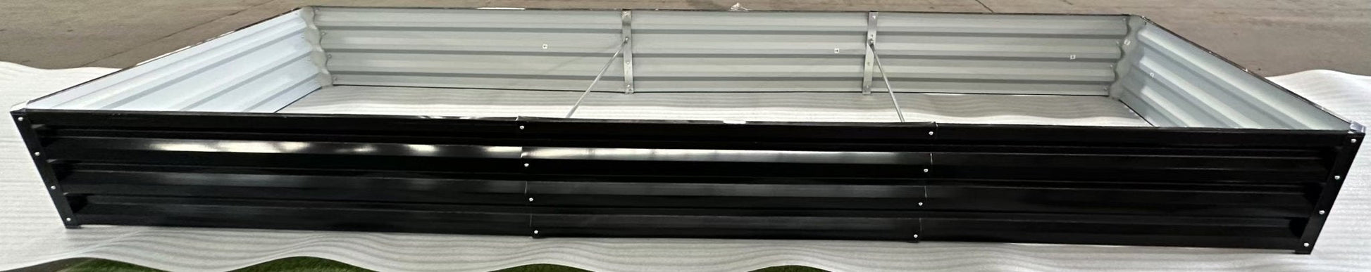 Modern Black Steel Raised Garden Bed for Vegetables and Flowers

Durable Rectangle Outdoor Planter with Rust-Resistant Coating

Heavy-Duty Black Steel Garden Bed for Backyard Growing