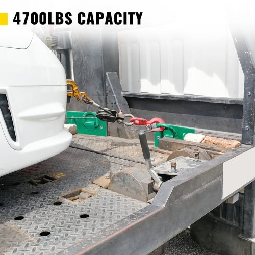 Green tractor bucket tie-down plate with grab hooks and D-rings
Kit mounted on loader bucket
All hardware included in tie-down kit
Yellow version of the tie-down plate
Product with tools and bolts laid out