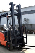 CanLift 4000 LBS orange electric forklift with 118” lift and 42” forks
Profile shot of forklift with raised mast and battery housing
Rear view of forklift with control panel and operator seat
42” heavy-duty forks and solid tires
Close-up of fork shifting mechanism