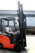 CanLift 4000 LBS orange electric forklift with 118” lift and 42” forks
Profile shot of forklift with raised mast and battery housing
Rear view of forklift with control panel and operator seat
42” heavy-duty forks and solid tires
Close-up of fork shifting mechanism