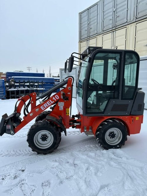 CanLift EREL10 electric wheel loader side view
Red electric wheel loader lifting materials
Bobcat-style quick hitch on CanLift loader
72V battery electric loader in warehouse
Heavy-duty compact loader with bucket attachment