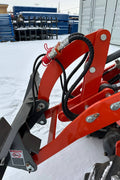CanLift EREL10 electric wheel loader side view
Red electric wheel loader lifting materials
Bobcat-style quick hitch on CanLift loader
72V battery electric loader in warehouse
Heavy-duty compact loader with bucket attachment