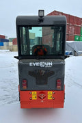 CanLift EREL10 electric wheel loader side view
Red electric wheel loader lifting materials
Bobcat-style quick hitch on CanLift loader
72V battery electric loader in warehouse
Heavy-duty compact loader with bucket attachment