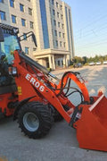 CanLift Mini Wheel Loader with Kubota D1703 engine
Orange and gray wheel loader with enclosed cabin
Compact loader with quick hitch and bucket
Mini loader for snow removal and landscaping
Hydrostatic drive mini loader with joystick control