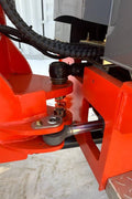 CanLift Mini Wheel Loader with Kubota D1703 engine, orange color – front view
Side view of CanLift compact loader with closed cabin and bucket raised
CanLift mini loader in operation – orange machine on construction site