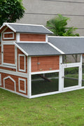 Spacious outdoor poultry run with wooden coop and predator-proof wire mesh