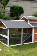 Backyard rabbit hutch and chicken shelter with secure fencing and stylish design