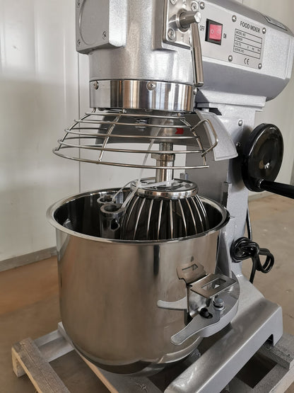 15 QT commercial dough mixer on stainless steel counter

Stainless steel mixing bowl with guard closed

Front view of food-grade commercial mixer with attachments

Dough hook installed on industrial kitchen mixer