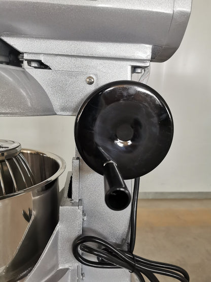 15 QT commercial dough mixer on stainless steel counter

Stainless steel mixing bowl with guard closed

Front view of food-grade commercial mixer with attachments

Dough hook installed on industrial kitchen mixer