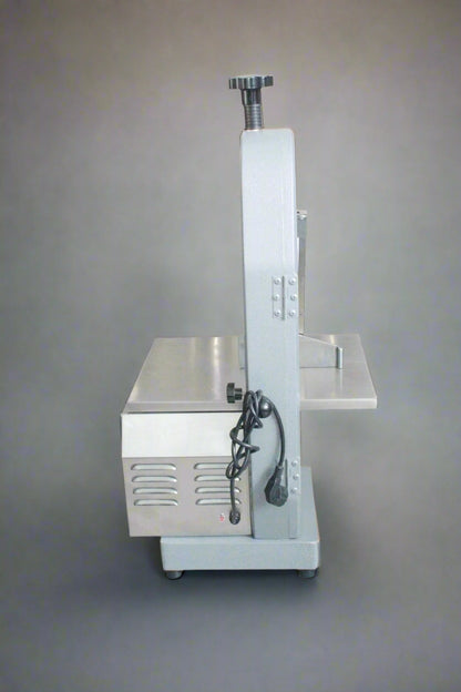 Main view of stainless steel meat and bone cutting saw machine

Compact commercial meat saw for kitchen or butcher use

Electric bone saw with sliding tray and safety guard

Replacement blade for commercial bone saw machine

Close-up of saw handle and stainless construction