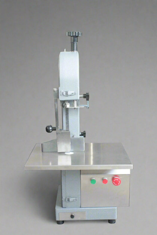 Main view of stainless steel meat and bone cutting saw machine

Compact commercial meat saw for kitchen or butcher use

Electric bone saw with sliding tray and safety guard

Replacement blade for commercial bone saw machine

Close-up of saw handle and stainless construction