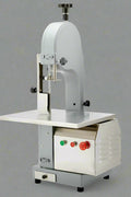 Main view of stainless steel meat and bone cutting saw machine

Compact commercial meat saw for kitchen or butcher use

Electric bone saw with sliding tray and safety guard

Replacement blade for commercial bone saw machine

Close-up of saw handle and stainless construction