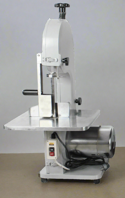 750W Commercial Stainless Steel Meat & Bone Saw – Front View
Cutting pork and ribs with BR0741 Meat Saw
Adjustable cutting thickness workbench with measurement scale
Stainless blade and food-safe housing details