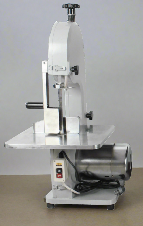 750W Commercial Stainless Steel Meat & Bone Saw – Front View
Cutting pork and ribs with BR0741 Meat Saw
Adjustable cutting thickness workbench with measurement scale
Stainless blade and food-safe housing details