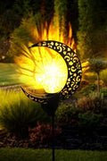 Crescent moon shaped solar LED light for garden pathway
Warm white crackle glass orb on solar-powered metal stand
Outdoor crescent moon decor light with solar panel
Elegant crackle glass garden light at night glowing warm white
Solar crescent garden light illuminating flower bed