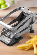 Stainless steel French fry cutter with 2 blades model 431012
Heavy-duty fry cutter with suction base and lever handle
Restaurant-quality potato slicer with thick and thin cut blades