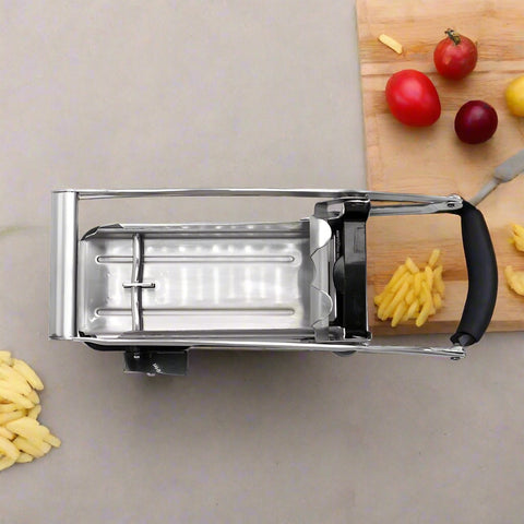 Stainless steel French fry cutter with 2 blades model 431012
Heavy-duty fry cutter with suction base and lever handle
Restaurant-quality potato slicer with thick and thin cut blades