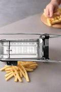 Stainless steel French fry cutter with 2 blades model 431012
Heavy-duty fry cutter with suction base and lever handle
Restaurant-quality potato slicer with thick and thin cut blades