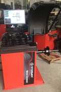 Deluxe red wheel balancer machine with HD LCD screen

Tire balancing machine in auto shop with digital interface

Close-up of WB300A wheel balancer control screen

Precision wheel balancing tool for auto repair garages

