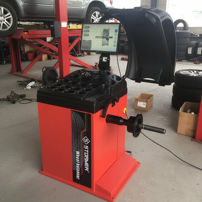 Deluxe red wheel balancer machine with HD LCD screen

Tire balancing machine in auto shop with digital interface

Close-up of WB300A wheel balancer control screen

Precision wheel balancing tool for auto repair garages


