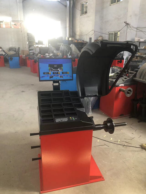 Deluxe red wheel balancer machine with HD LCD screen

Tire balancing machine in auto shop with digital interface

Close-up of WB300A wheel balancer control screen

Precision wheel balancing tool for auto repair garages

