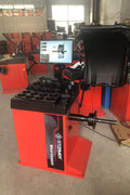 Deluxe red wheel balancer machine with HD LCD screen

Tire balancing machine in auto shop with digital interface

Close-up of WB300A wheel balancer control screen

Precision wheel balancing tool for auto repair garages

